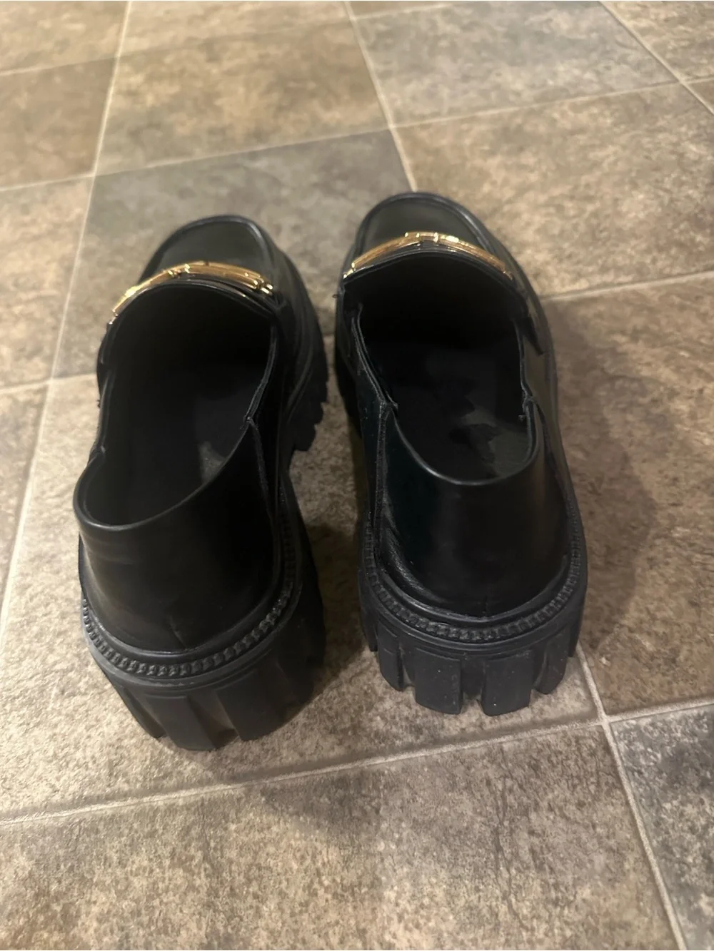 Black Leather Lug-Sole Loafers with Gold Chain Accent